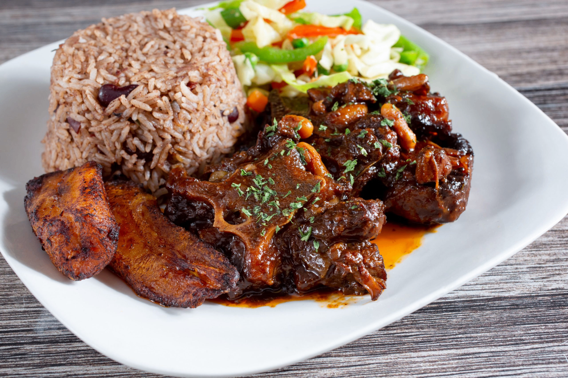 Jamaican jerk grill at tropical beach sunset